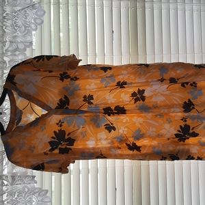 Beautiful flowy yellow dress with flowers.